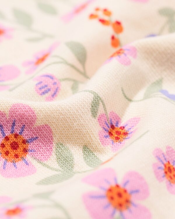 babypyjama bloemen roze