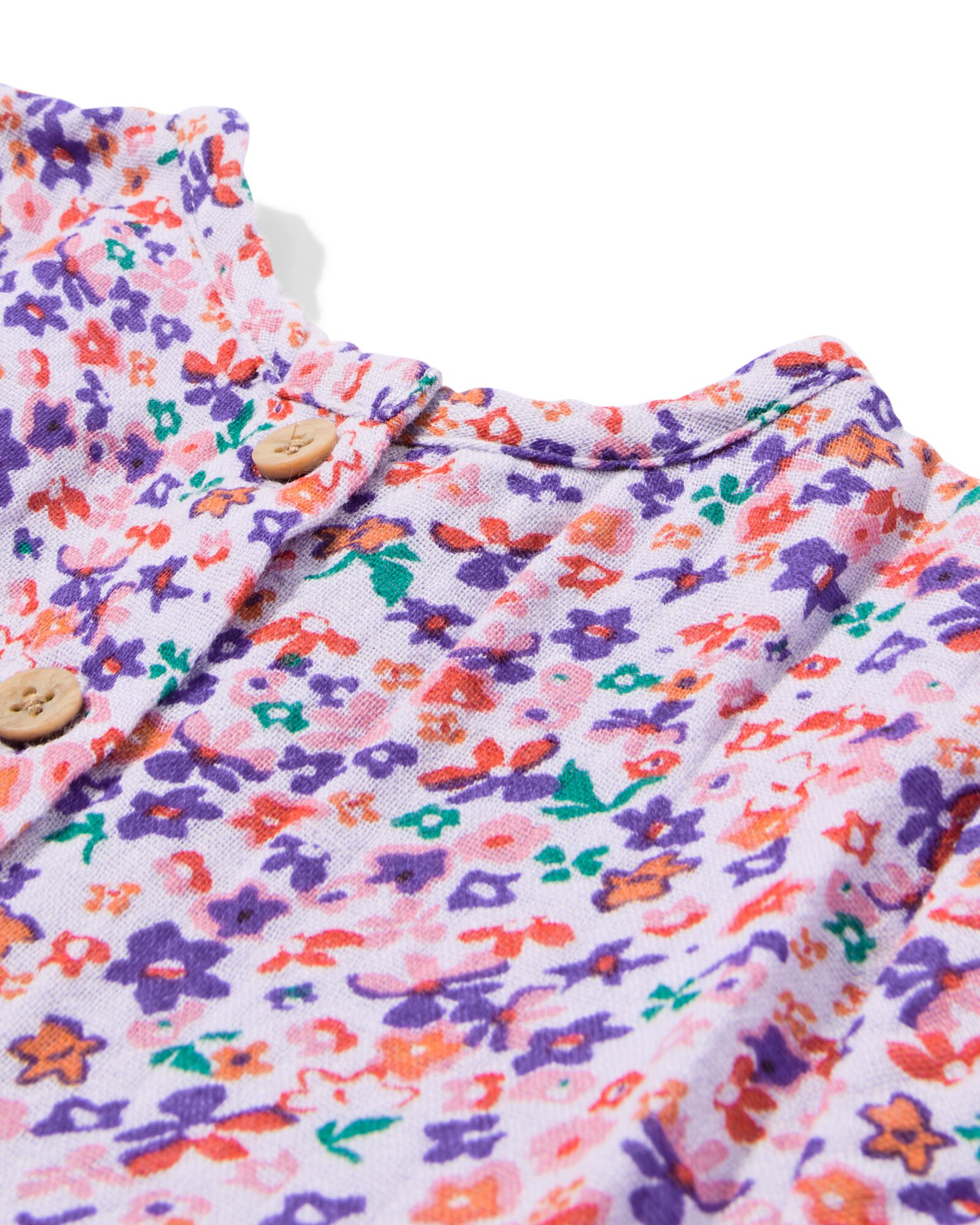 HEMA Babyjurk mousseline bloemen paars 1 HEMA Babyjurk mousseline bloemen paars